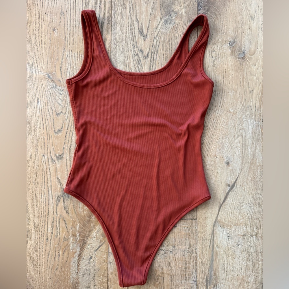 Rust One Piece never been worn